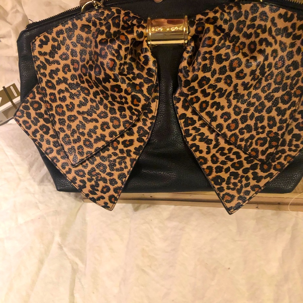 Betsey Johnson black bag with leopard bow